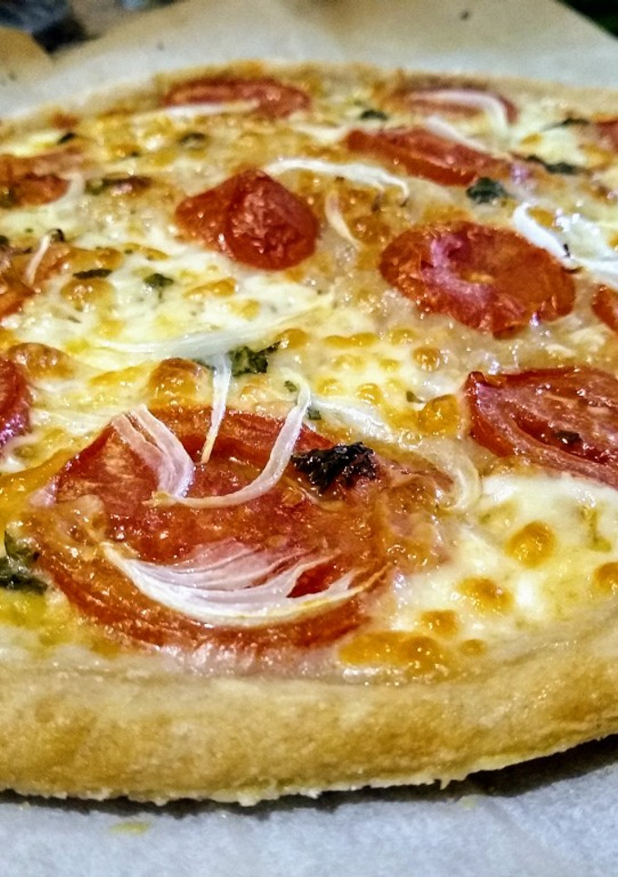 Una foto de Pizza con masa madre