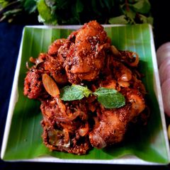 A picture of Spicy chicken ghee roast.