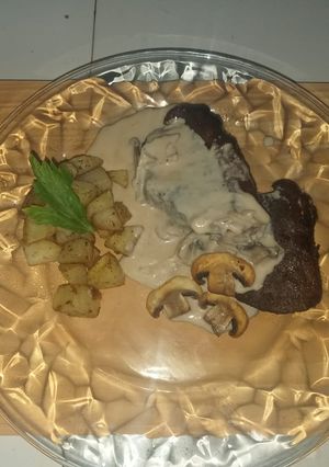 Una foto de Pierna de res en salsa bechamel