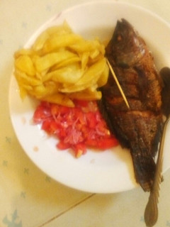 A picture of Chips kachumbari and fried fish#authormarathon.