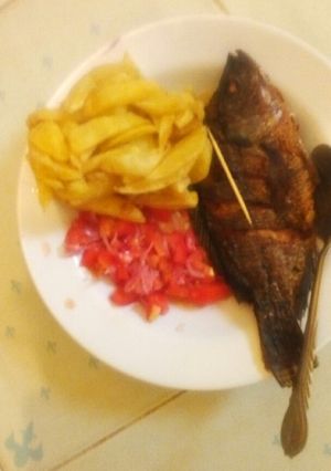 A picture of Chips kachumbari and fried fish#authormarathon.