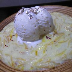A picture of Sevaiiyan Topped with Mava Ice Cream.