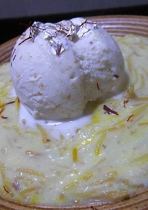 A picture of Sevaiiyan Topped with Mava Ice Cream.
