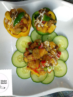A picture of Meaty plantain stuffed bell pepper.