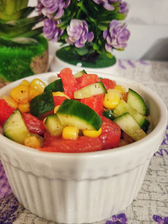 A picture of 3 coloured corn salad.