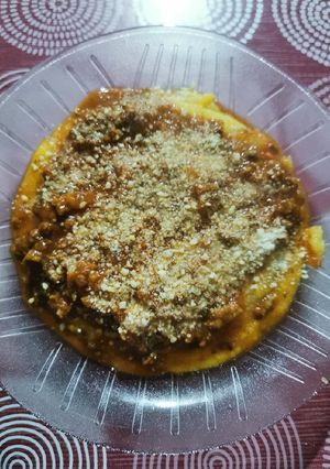 Una foto de Polenta con salsa boloñesa