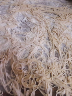 Una foto de Fideos caseros con salsa