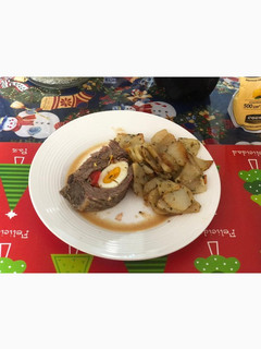 Una foto de Colita de cuadril rellena con papas al horno