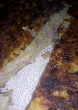 Una foto de Tortillas de papa rellena de jamón y queso
