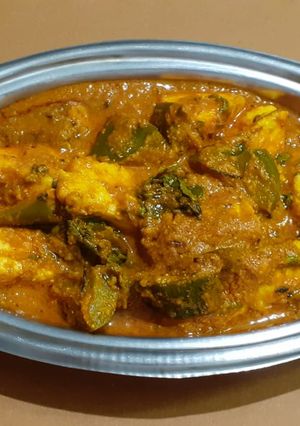 A picture of Corn paneer capsicum curry.