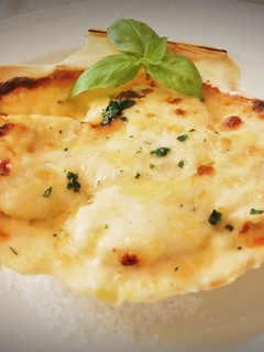 Una foto de Vieiras gratinadas