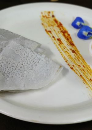 A picture of Butterfly pea urad dal dosa.