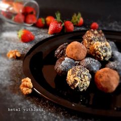 A picture of Walnut chocolate truffle ball.