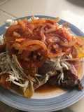 Chuleta de cerdo con tajadas