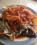Chuleta de cerdo con tajadas