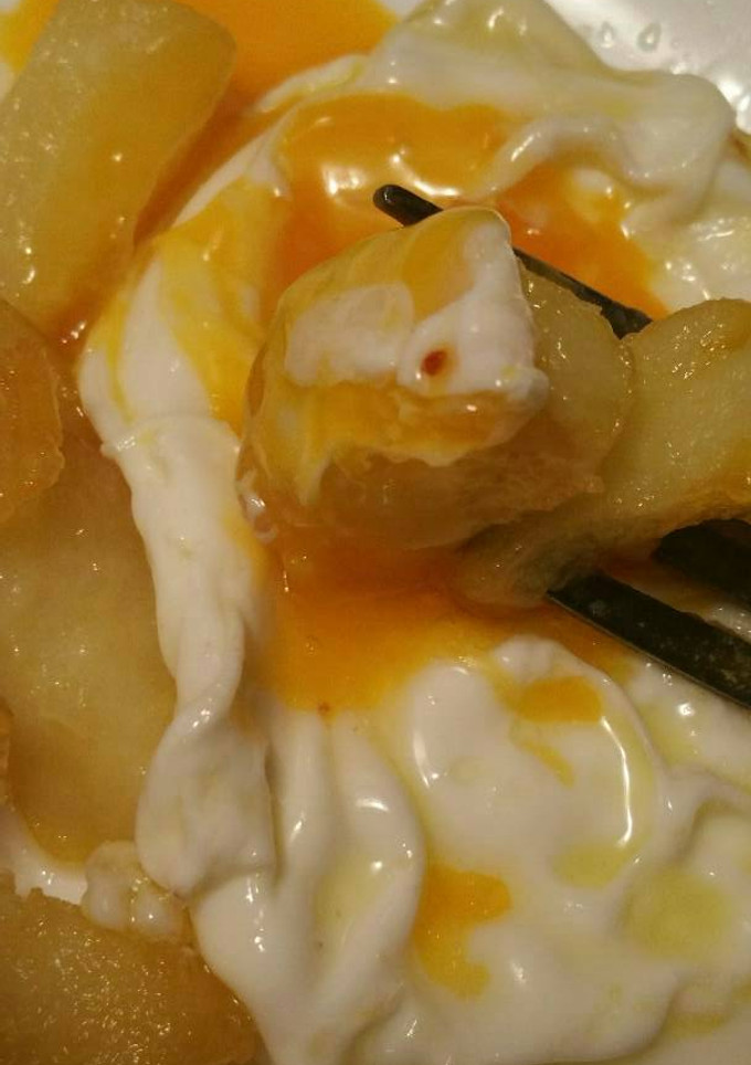 Una foto de Huevos con papas