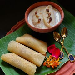 Gur’er Patishapta Pithe A picture of Gur’er Patishapta Pithe.