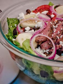 A picture of Greek Bison Steak Salad.