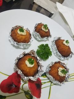 Una foto de Bolitas Buffalo con Madurito