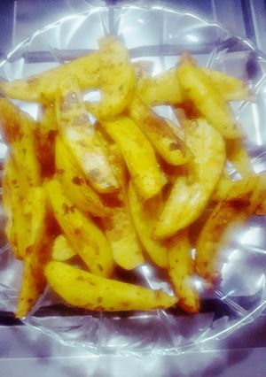 A picture of Potato wedges.