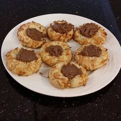 A picture of Chocolate Mousse Filled Coconut Shortbread Cookies.