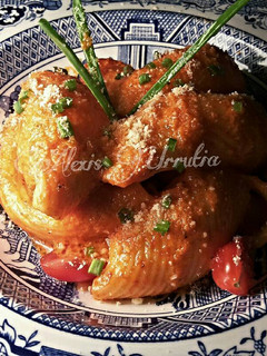 Una foto de Lumaconis en salas de piquillos y parmesano