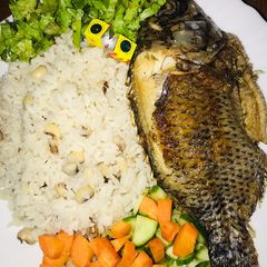 A picture of Rice and beans with fish.