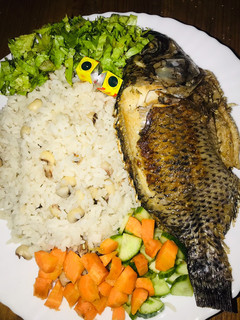 A picture of Rice and beans with fish.