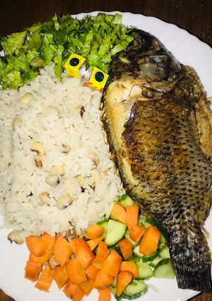 A picture of Rice and beans with fish.