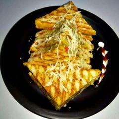 A picture of Vegetable and cheeze sandwich.