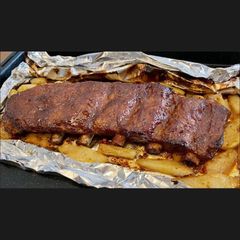 Baby Back Ribs 烤豬肋骨 A picture of Baby Back Ribs 烤豬肋骨.