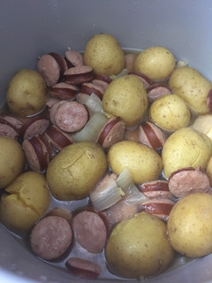 A picture of Sausage and potatoes.