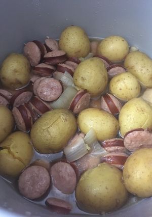 A picture of Sausage and potatoes.