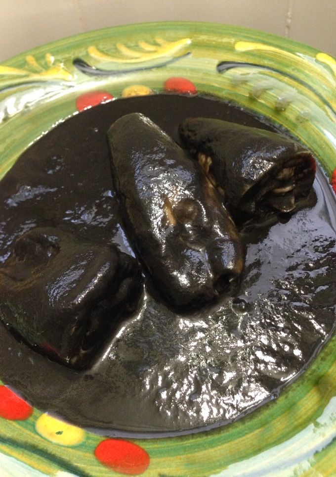 Una foto de Chipirones en su tinta
