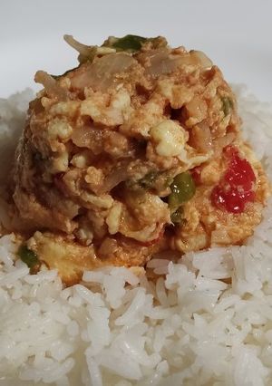 A picture of Scrambled Eggs with Spiced Tomato Purée.