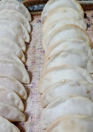 Una foto de Empanaditas copetín de jamón y queso