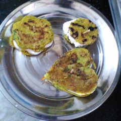 A picture of Mixed veg multigrain chilla sandwitch.