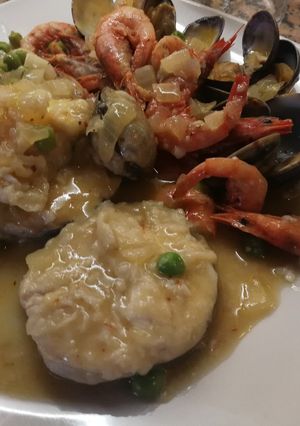 Foto principal de Merluza con gambas y almejas