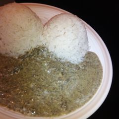 A picture of Cassava leaves with coconut milk.