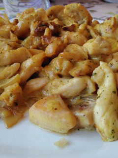 Una foto de Tiritas de pollo al curry