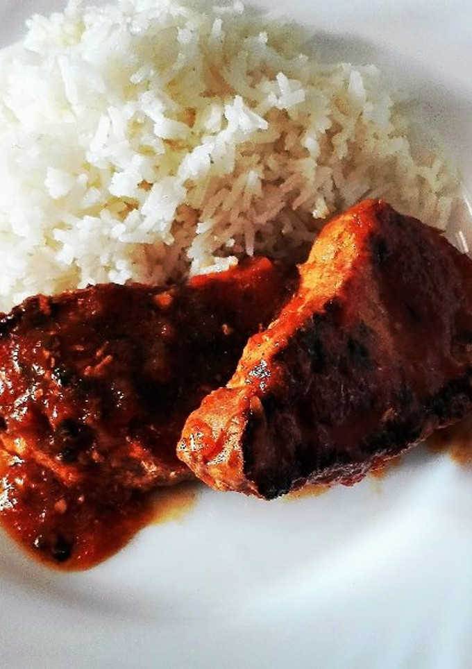Una foto de Lomo en dos salsas