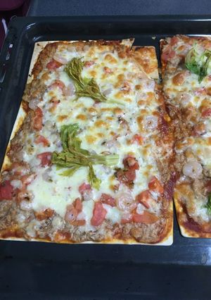 Una foto de Pizza de atún