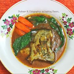 A picture of Pan Seared Pomfret & Glazed carrots & Fish Consommé.