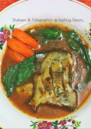 A picture of Pan Seared Pomfret & Glazed carrots & Fish Consommé.