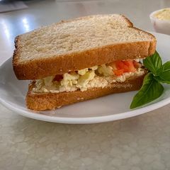 Scrambled egg on Hummus toast A picture of Scrambled egg on Hummus toast.