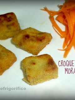 Una foto de Croquetas de cebolla morada y queso manchego