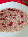 Risotto con formaggio filante e melograno
