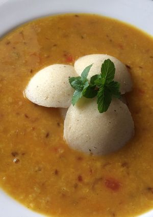 A picture of Moong dal with rice idli.