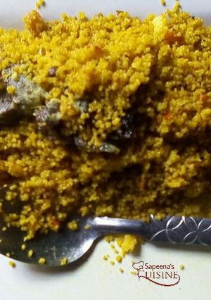A picture of Couscous with carrots.