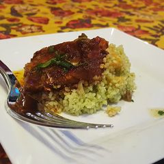 A picture of Summer couscous and heirloom tomato vinaigrette.